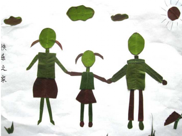 小学树叶贴画作品：快乐的一家人