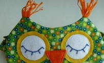 用花色斑点布料做一个猫头鹰样子的眼罩